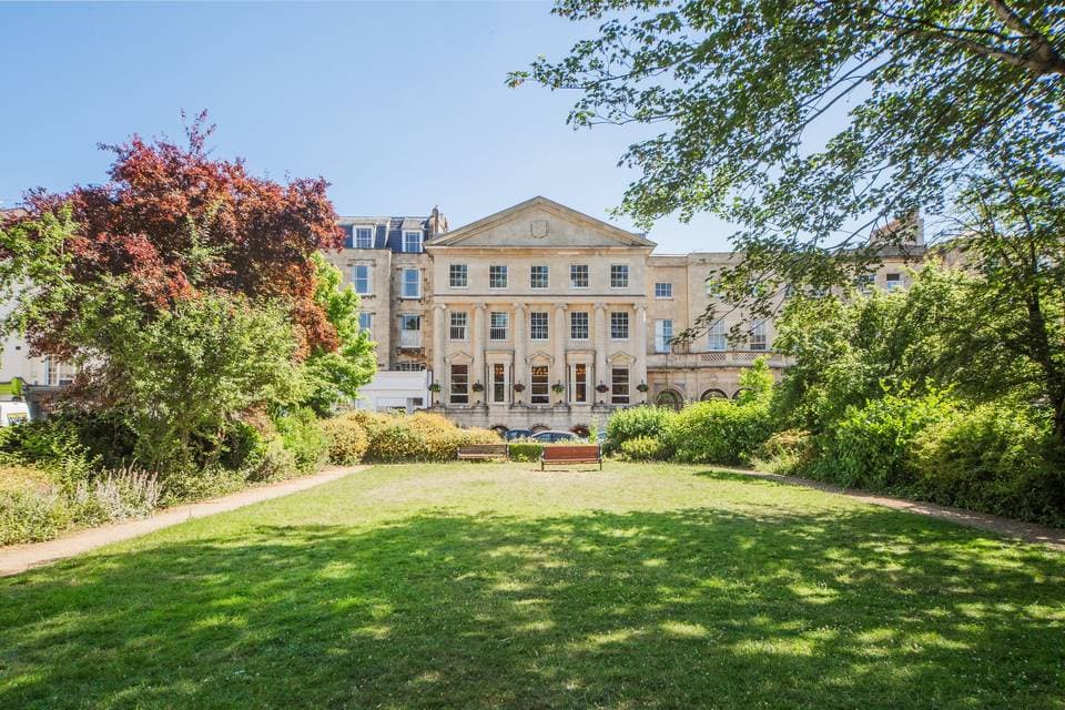 The Georgian facade of Clifton Members Club seen across the green, Clifton, Bristol