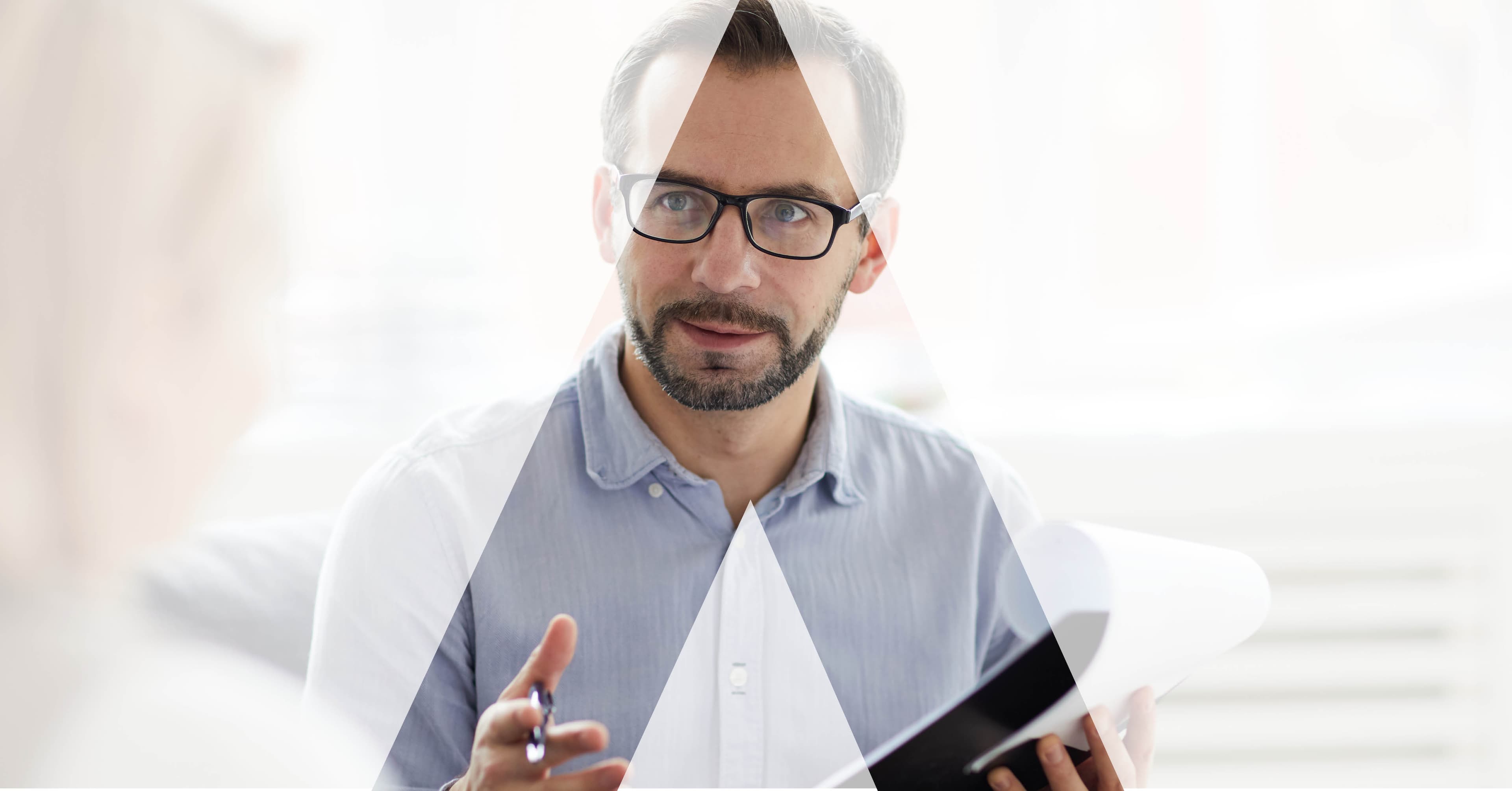 A commercial lead working through a document, in the AGENCY watermark treatment